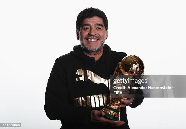 Diego Maradona of Argentina poses with the FIFA World Cup trophy prior to The Best FIFA Football Awards at Kameha Zurich Hotel on January 8, 2017 in...