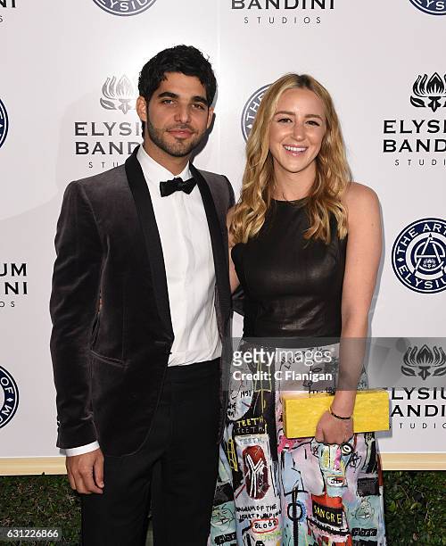 Songwriter Freddy Wexler and Olivia Zaro attend The Art of Elysium presents Stevie Wonder's HEAVEN - Celebrating the 10th Anniversary at Red Studios...
