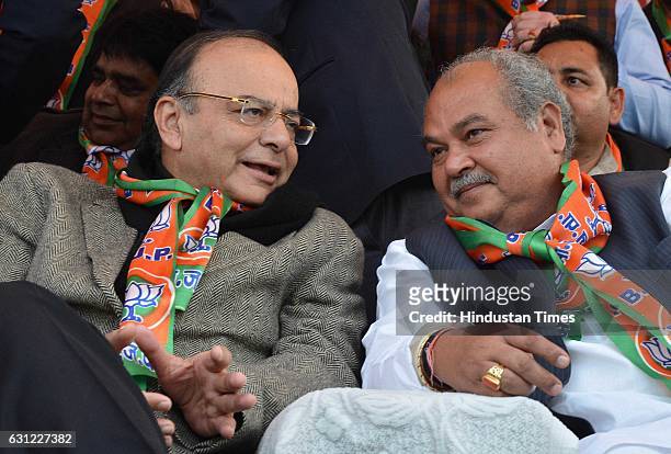 Union Finance Minister Arun Jaitley and Narendra Singh Tomar, Minister for State for Rural Development, during a rally held to receive Sankalp Yatra...