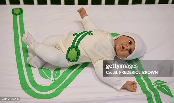 The Mimo Smart Baby Monitor, a device to be placed on the child or on the bed which monitors baby's breathing and activity, is on display at the 2017...