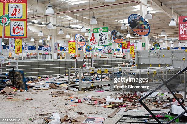 Debris sits inside a Bodega Comercial Mexicana store following looting in Veracruz City, Mexico, on Sunday, Jan. 8, 2017. Mexico's National...