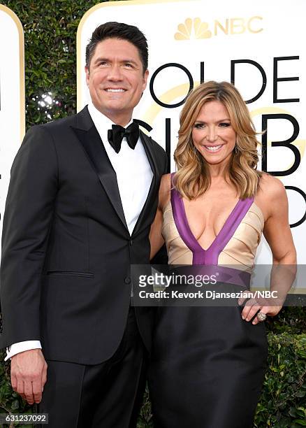 74th ANNUAL GOLDEN GLOBE AWARDS -- Pictured: Actor Jon Falcone and television host Debbie Matenopoulos arrive to the 74th Annual Golden Globe Awards...