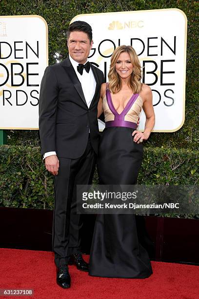 74th ANNUAL GOLDEN GLOBE AWARDS -- Pictured: Actor Jon Falcone and television host Debbie Matenopoulos arrive to the 74th Annual Golden Globe Awards...
