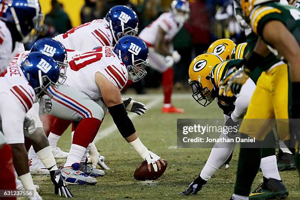 The New York Giants and Green Bay Packers line up for a play during the NFC Wild Card game at Lambeau Field on January 8, 2017 in Green Bay,...