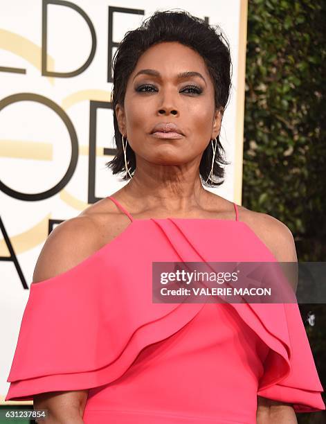 Angela Bassett arrives at the 74th annual Golden Globe Awards, January 8 at the Beverly Hilton Hotel in Beverly Hills, California. / AFP / VALERIE...