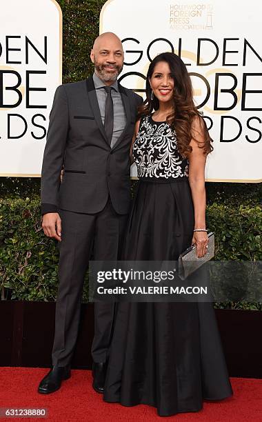 Producer John Ridley and Gayle Ridley arrive at the 74th annual Golden Globe Awards, January 8 at the Beverly Hilton Hotel in Beverly Hills,...