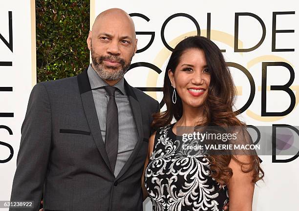 Producer John Ridley and Gayle Ridley arrive at the 74th annual Golden Globe Awards, January 8 at the Beverly Hilton Hotel in Beverly Hills,...