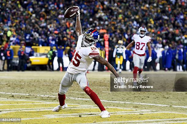 Tavarres King of the New York Giants celebrates after scoring a touchdown in the third quarter during the NFC Wild Card game against the Green Bay...