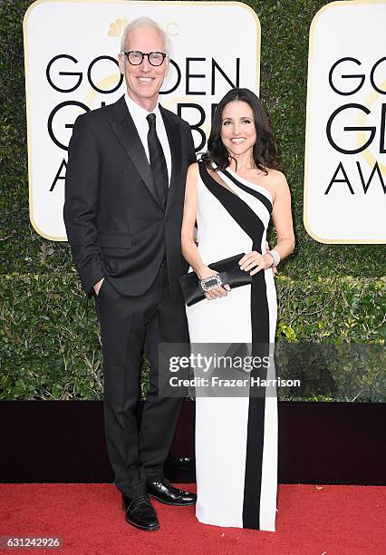 Actress Julia Louis-Dreyfus and Brad Hall attend the 74th Annual Golden Globe Awards at The Beverly Hilton Hotel on January 8, 2017 in Beverly Hills,...