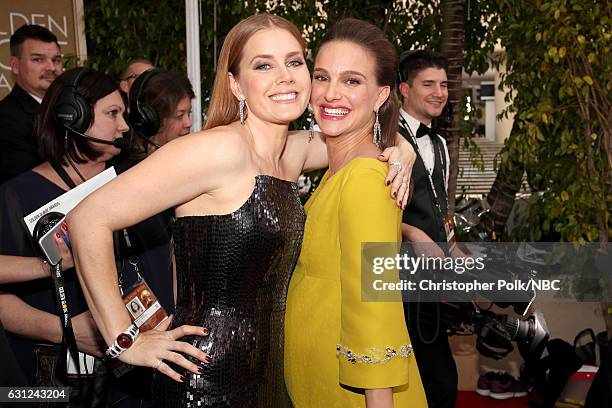 74th ANNUAL GOLDEN GLOBE AWARDS -- Pictured: Actors Amy Adams and Natalie Portman arrive to the 74th Annual Golden Globe Awards held at the Beverly...