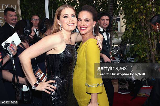 74th ANNUAL GOLDEN GLOBE AWARDS -- Pictured: Actors Amy Adams and Natalie Portman arrive to the 74th Annual Golden Globe Awards held at the Beverly...