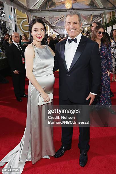 74th ANNUAL GOLDEN GLOBE AWARDS -- Pictured: Writer Rosalind Ross and director/actor Mel Gibson arrive to the 74th Annual Golden Globe Awards held at...