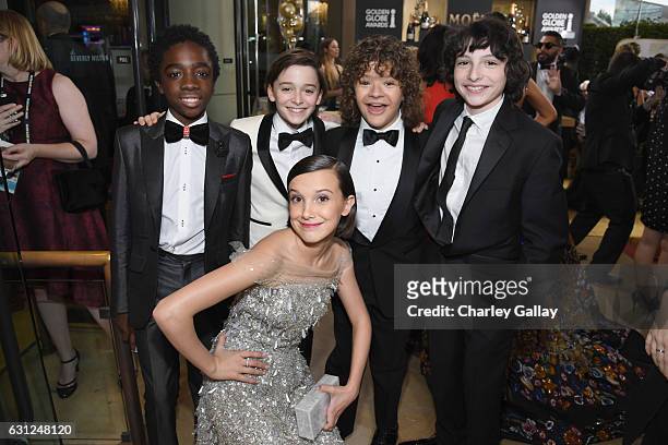 Actors Caleb McLaughlin, Noah Schnapp, Gaten Matarazzo, Finn Wolfhard, and Millie Bobby Brown at the 74th annual Golden Globe Awards sponsored by...