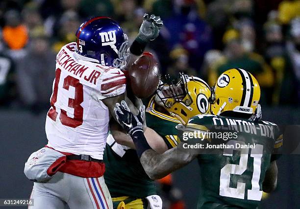 Jake Ryan of the Green Bay Packers breaks up a pass intended for Odell Beckham of the New York Giants in the fourth quarter during the NFC Wild Card...