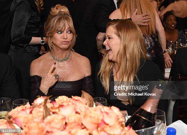 Actresses Goldie Hawn and Amy Schumer attend the 74th Annual Golden Globe Awards at The Beverly Hilton Hotel on January 8, 2017 in Beverly Hills,...