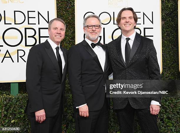 74th ANNUAL GOLDEN GLOBE AWARDS -- Pictured: Producer Clark Spencer and co-directors Rich Moore and Byron Howard arrive to the 74th Annual Golden...