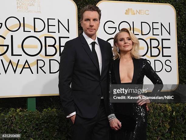 74th ANNUAL GOLDEN GLOBE AWARDS -- Pictured: Actors Dax Shepard and Kristen Bell arrive to the 74th Annual Golden Globe Awards held at the Beverly...