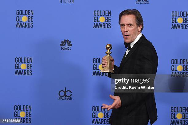 Actor Hugh Laurie, winner of Best Supporting Actor in a Series, Miniseries or Television Film for 'The Night Manager,' poses in the press room during...