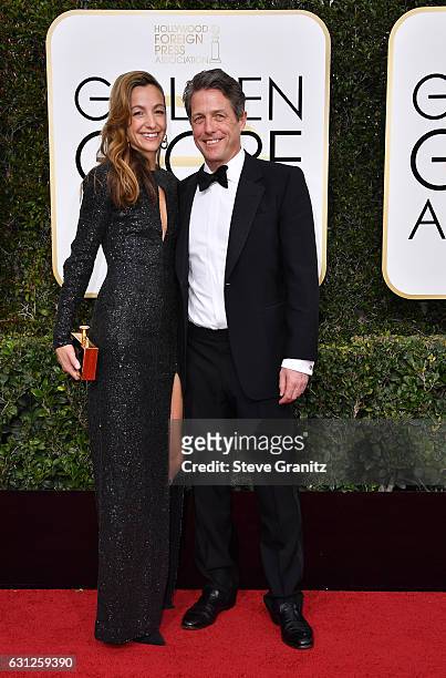 Actor Hugh Grant and Anna Eberstein attend the 74th Annual Golden Globe Awards at The Beverly Hilton Hotel on January 8, 2017 in Beverly Hills,...