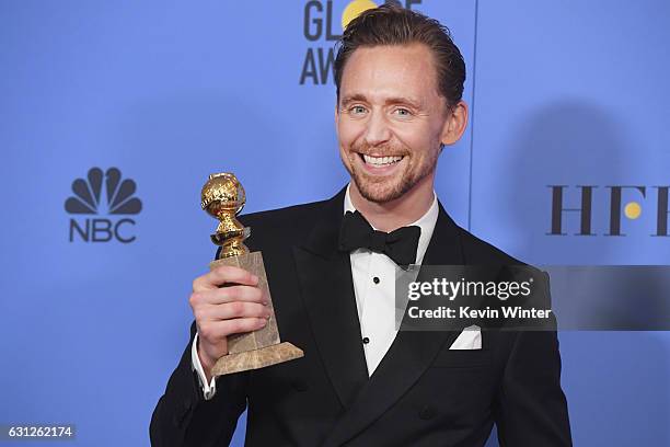 Actor Tom Hiddleston, winner of Best Actor in a Miniseries or Television Film for 'The Night Manager,' poses in the press room during the 74th Annual...