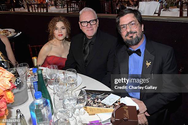 Actress Bernadette Peters, Malcolm McDowell and producer Roman Coppola at the 74th annual Golden Globe Awards sponsored by FIJI Water at The Beverly...