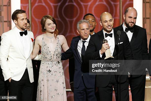 In this handout photo provided by NBCUniversal, Ryan Gosling, Emma Stone, Marc Platt, John Legend, Fred Berger and Jordan Horowitz accept the award...