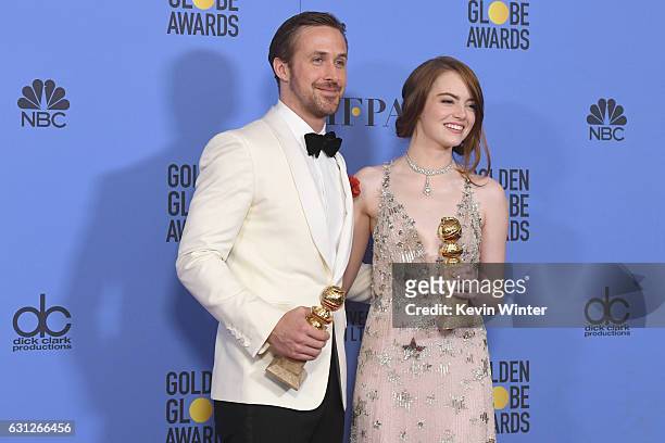 Actors Ryan Gosling and Emma Stone, winners for Best Actor and Best Actress in a Musical or Comedy Film for "La La Land", pose in the press room...