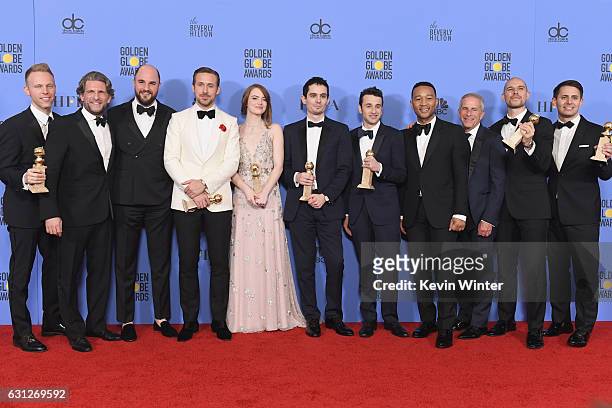 Cast and crew of 'La La Land,' winners of Best Motion Picture - Musical or Comedy, pose in the press room during the 74th Annual Golden Globe Awards...