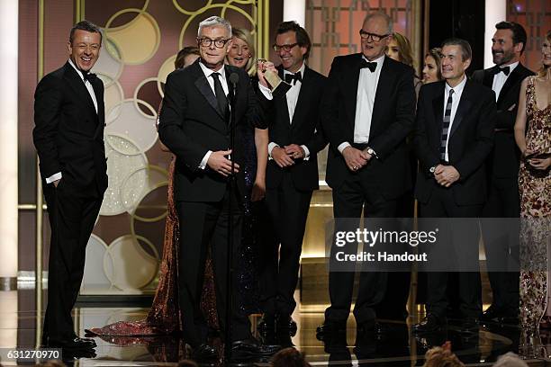 In this handout photo provided by NBCUniversal, producer and director Stephen Daldry accepts the award for Best Television Series - Drama for "The...