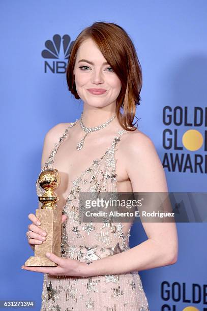 Actress Emma Stone poses in the press room during the 74th Annual Golden Globe Awards at The Beverly Hilton Hotel on January 8, 2017 in Beverly...