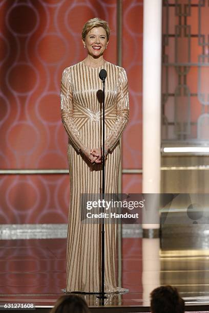 In this handout photo provided by NBCUniversal, presenter Annette Benning onstage during the 74th Annual Golden Globe Awards at The Beverly Hilton...