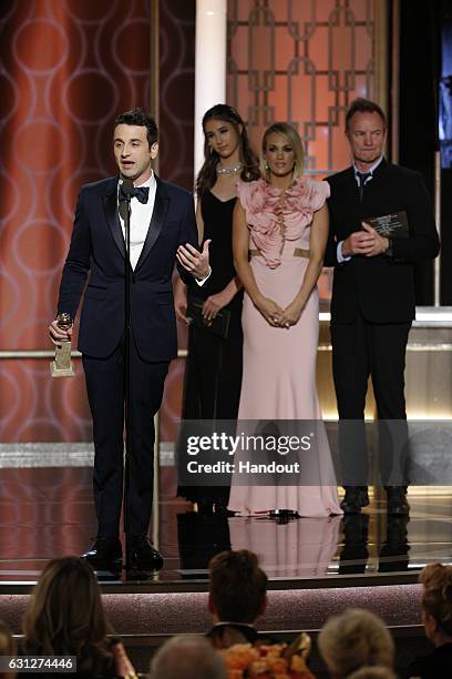 In this handout photo provided by NBCUniversal, Justin Hurwitz accepts the award for Best Original Score for "La La Land" during the 74th Annual...