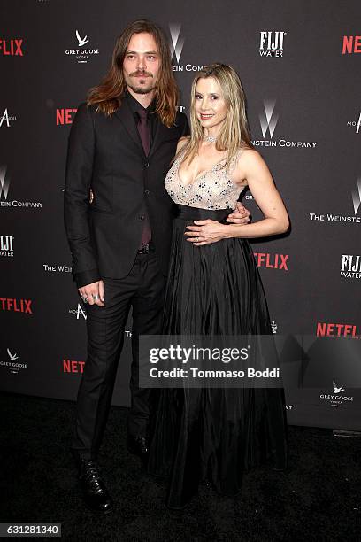 Christopher Backus and actress Mira Sorvino attend The Weinstein Company and Netflix Golden Globe Party, presented with FIJI Water, Grey Goose Vodka,...