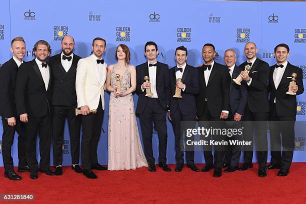 Cast and crew of 'La La Land,' winners of Best Motion Picture - Musical or Comedy, pose in the press room during the 74th Annual Golden Globe Awards...