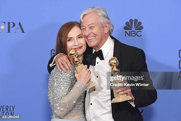 Actress Isabelle Huppert , winner of Best Actress in a Motion Picture - Drama for 'Elle,' and director Paul Verhoeven, winner of Best Foreign...