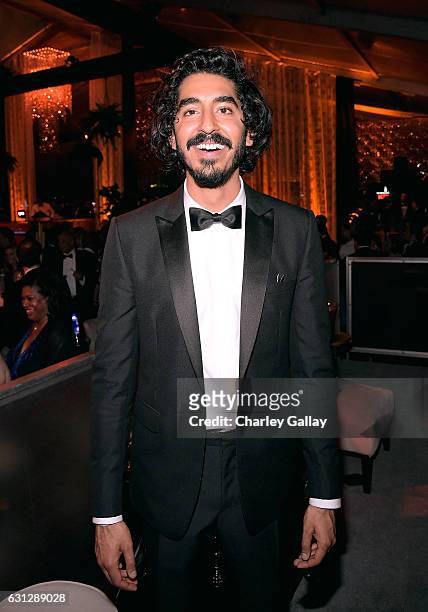 Actor Dev Patel attends The Weinstein Company and Netflix Golden Globes Party presented with Landmark Vineyards at The Beverly Hilton Hotel on...