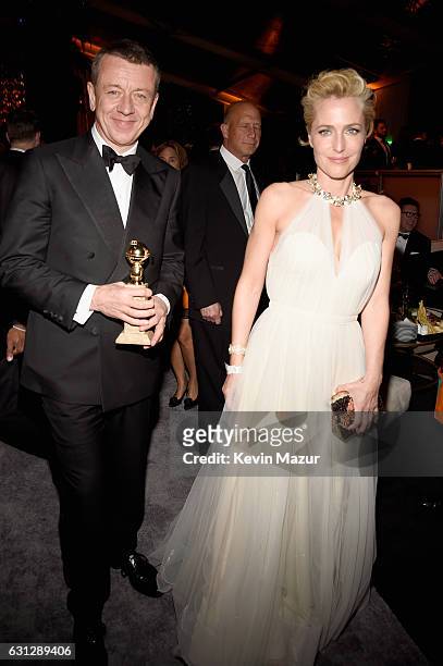 Producer Peter Morgan and actress Gillian Anderson attend The Weinstein Company and Netflix Golden Globe Party, presented with FIJI Water, Grey Goose...