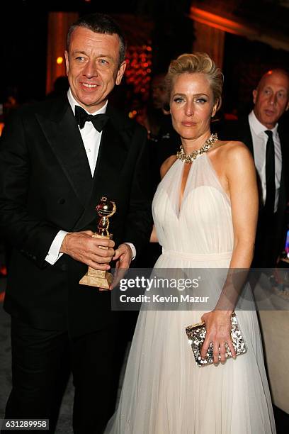 Producer Peter Morgan and actress Gillian Anderson attend The Weinstein Company and Netflix Golden Globe Party, presented with FIJI Water, Grey Goose...