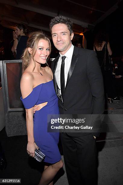 Actors Ashley Hinshaw and Topher Grace attend The Weinstein Company and Netflix Golden Globes Party presented with Landmark Vineyards at The Beverly...