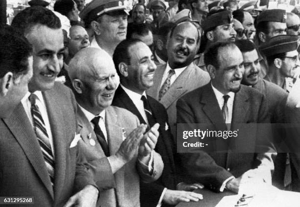 Leaders of four states make the first stage in the building of the Aswan High Dam, from left : President Gamal Abdul Nasser of Egypt, Soviet leader...