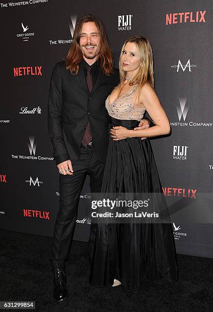 Christopher Backus and Mira Sorvino attend the 2017 Weinstein Company and Netflix Golden Globes after party on January 8, 2017 in Los Angeles,...