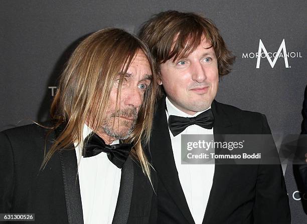Singer Iggy Pop and composer Daniel Pemberton attend The Weinstein Company and Netflix Golden Globe Party, presented with FIJI Water, Grey Goose...