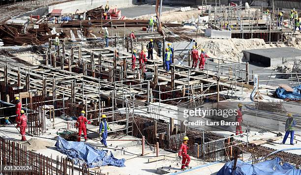 Workers are seen during a tour at the construction site of the Al Bayt Stadium and the workers accommodation on January 9, 2017 in Doha, Qatar. Al...