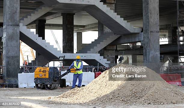 Workers are seen during a tour at the construction site of the Al Bayt Stadium and the workers accommodation on January 9, 2017 in Doha, Qatar. Al...