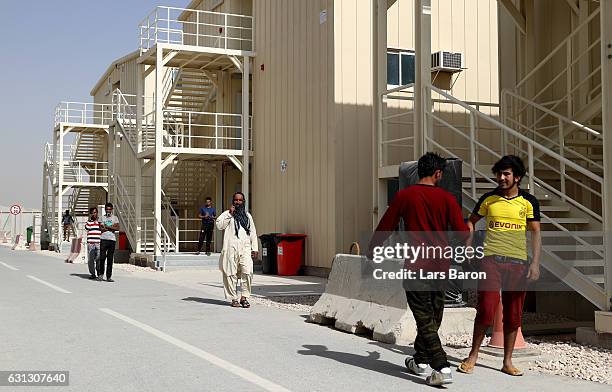 Workers are seen in their accommodation during a tour at the construction site of the Al Bayt Stadium and the workers accommodation on January 9,...