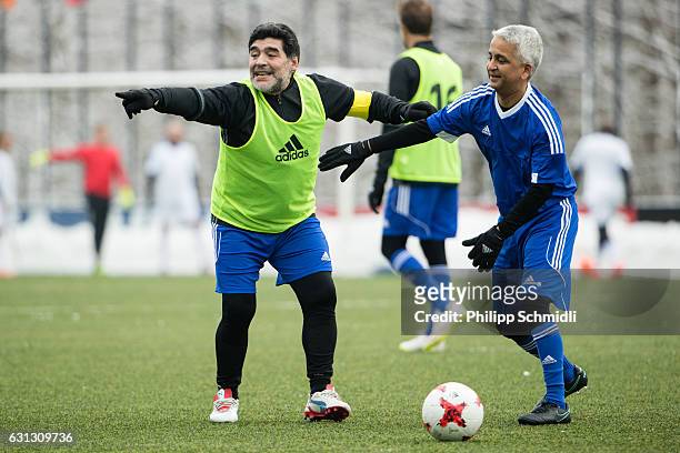 Diego Maradona jokes with FIFA Council member Sunil Gulati during a FIFA Team Friendly Football Match at the FIFA headquarters prior to The Best FIFA...