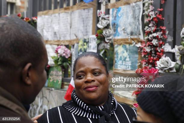 The mother of the late policewoman Clarissa Jean-Philippe stands in front of a memorial during a tribute ceremony in memory of her daughter in...