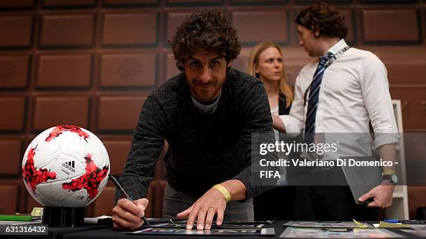 Pablo Aimar of Argentina signs prints prior to The Best FIFA Football Awards at Kameha Zurich Hotel on January 9, 2017 in Zurich, Switzerland.