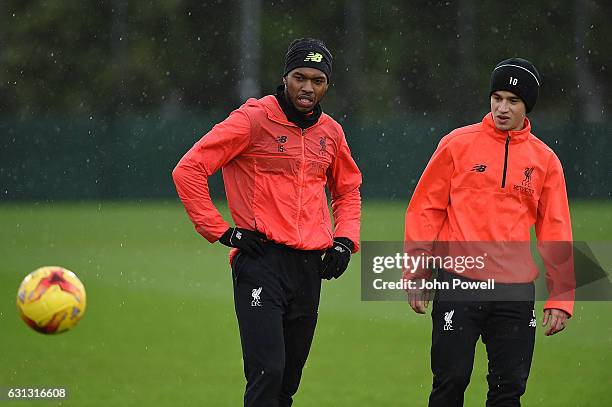 Daniel Sturridge and Philippe Couthino of Liverpool during a training session at Melwood Training Ground on January 9, 2017 in Liverpool, England.