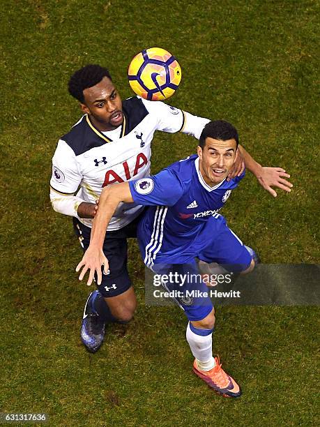 Danny Rose of Tottenham Hotspur and Pedro of Chelsea battle to win a header during the Premier League match between Tottenham Hotspur and Chelsea at...